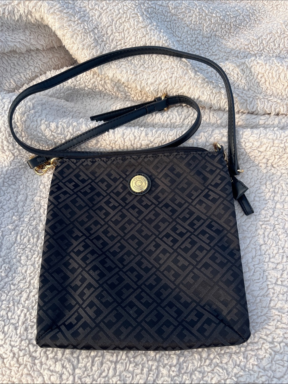 Tommy Hilfiger Black Monogrammed Thin Crossbody Bag with Gold Emblem